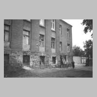 111-1008 Rueckseite des Kreishauses. Ganz unten befand sich Wohnung der Familie Schulz. Oben ganz rechts war der Sitzungssaal.jpg